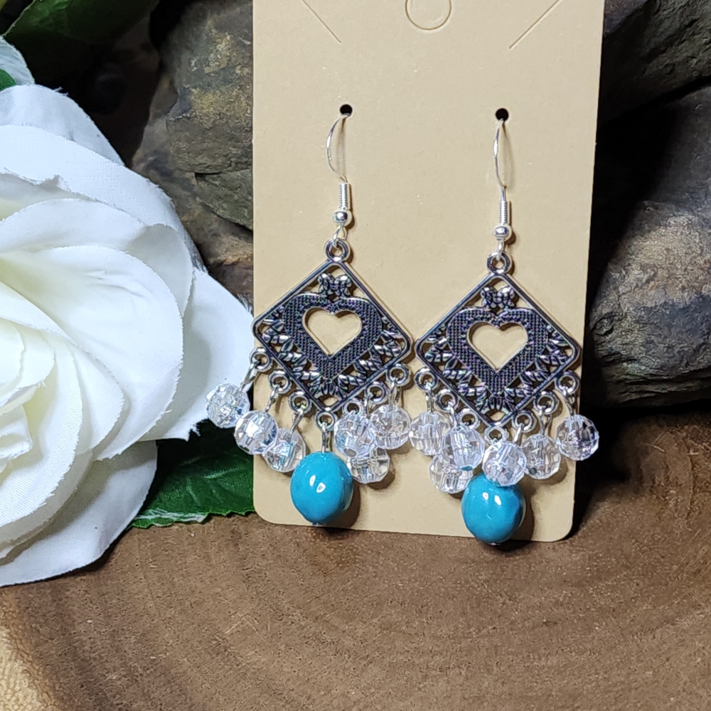 7. Hand Crafted Faux Turquoise and Silver Toned Heart Dangle Chandelier Earrings